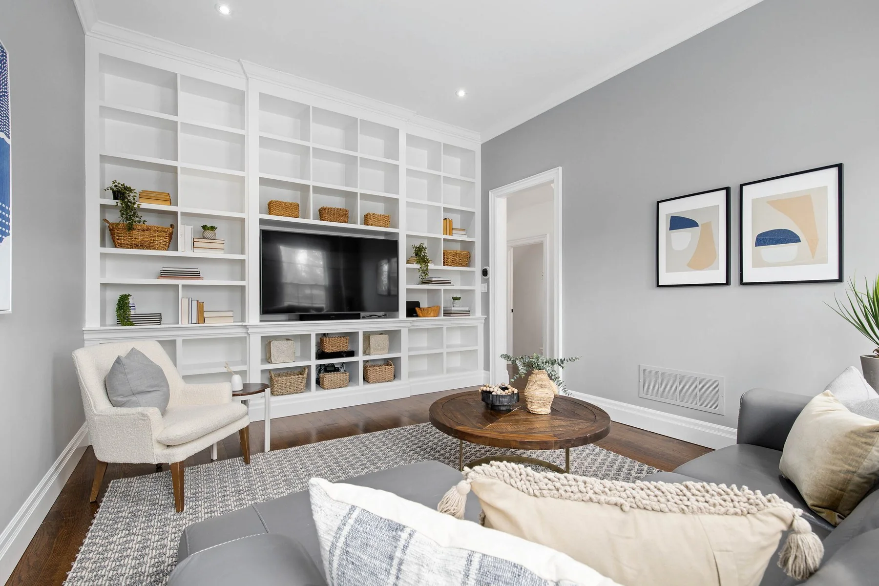 Bright living room with built-in cabinetry