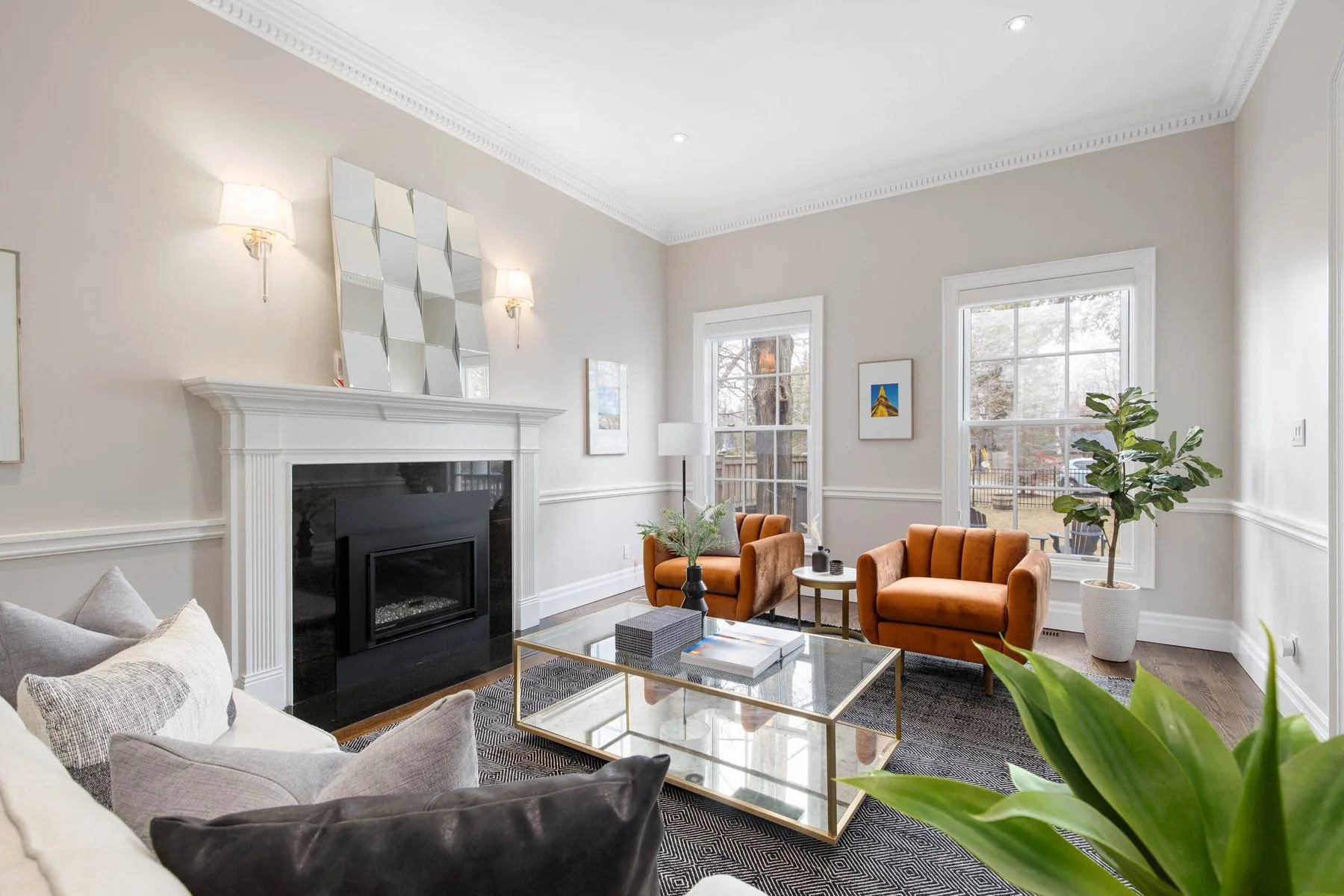 Living room with a fireplace and natural light